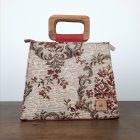 Eslo Manci hazai designer női  meggypiros gobelin bőr oldaltáska, prémium minőség, kézzel készített egyedi dizájn.